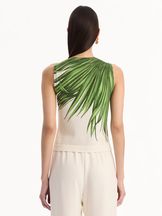 The model is wearing the Palm Leaves Tank in Green and Ivory. Featuring a crew neckline and banded trim. Back View.