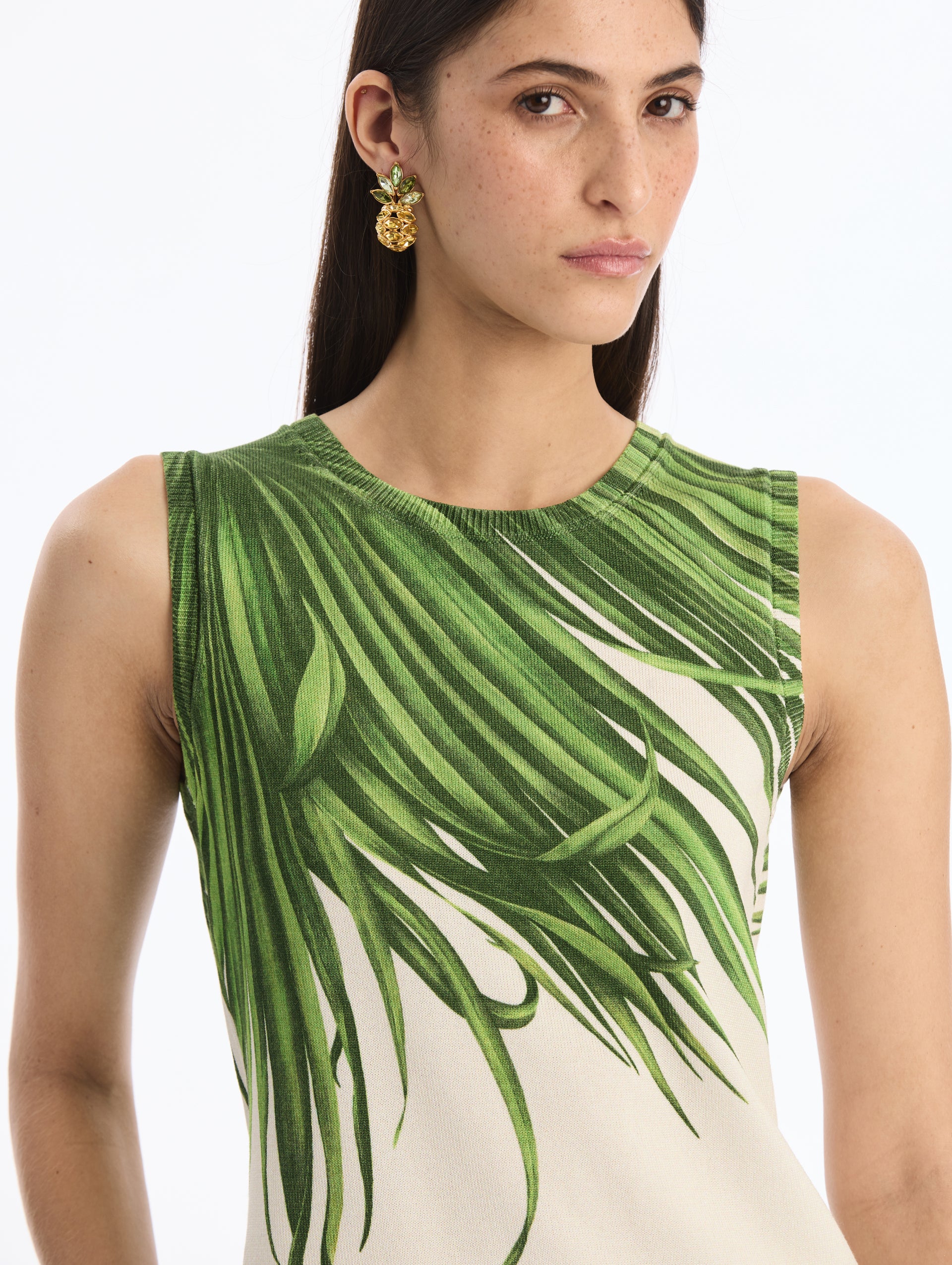 Sleeveless, Ivory, Crew Neck Tank Top with Green Palm Leaves Print. Front View. 
