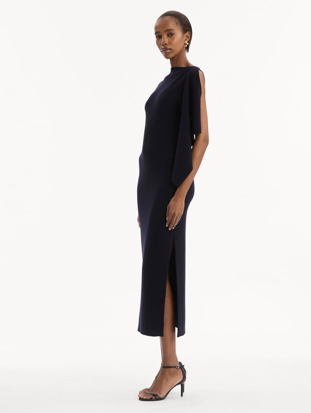 Hibiscus Brooch Knit Dress in Navy. Side view.