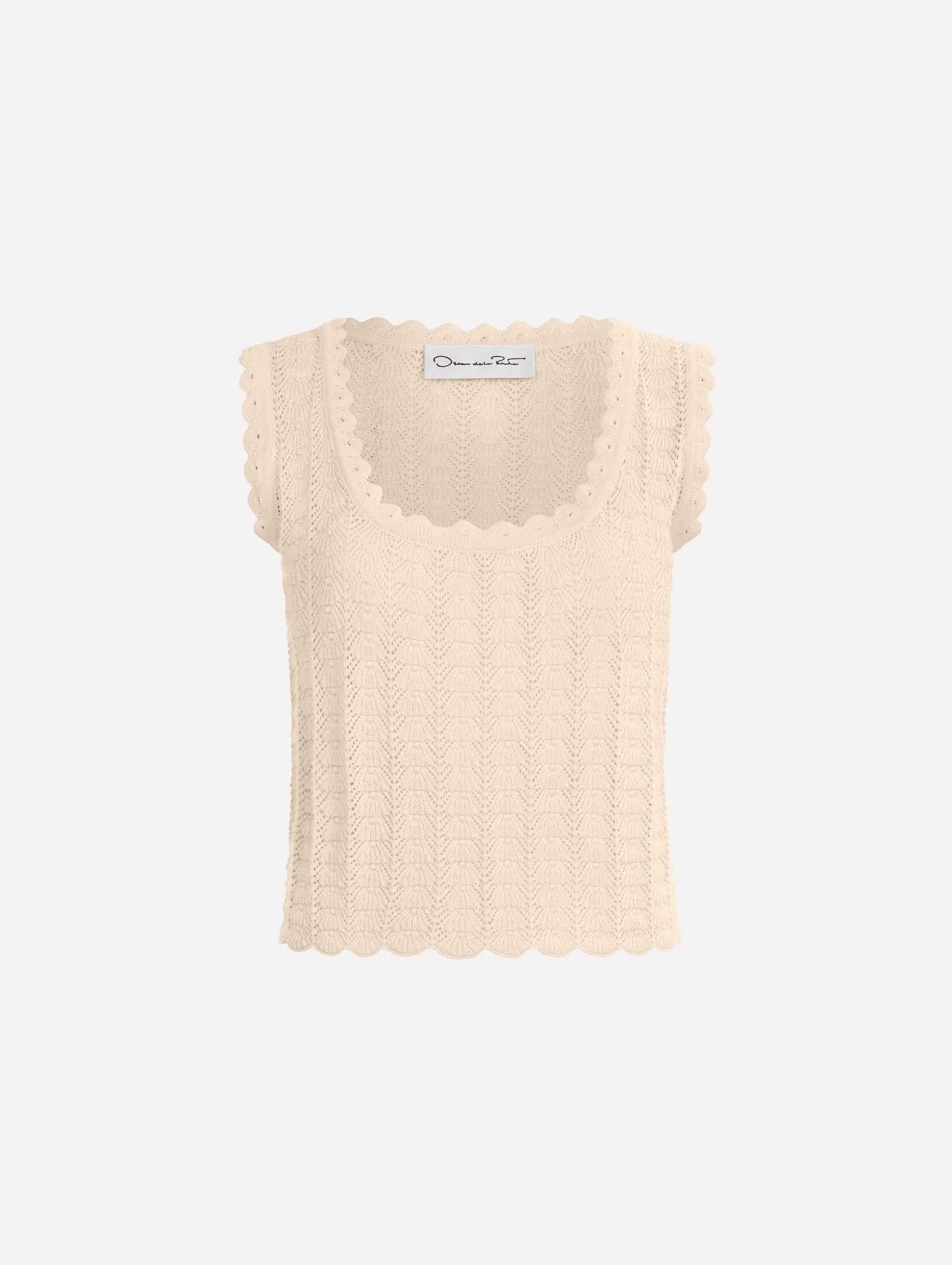 The Pointelle Weave Tank in Ivory. Featuring a scoop neckline, thick tank straps, and scalloped edges. Front View.
