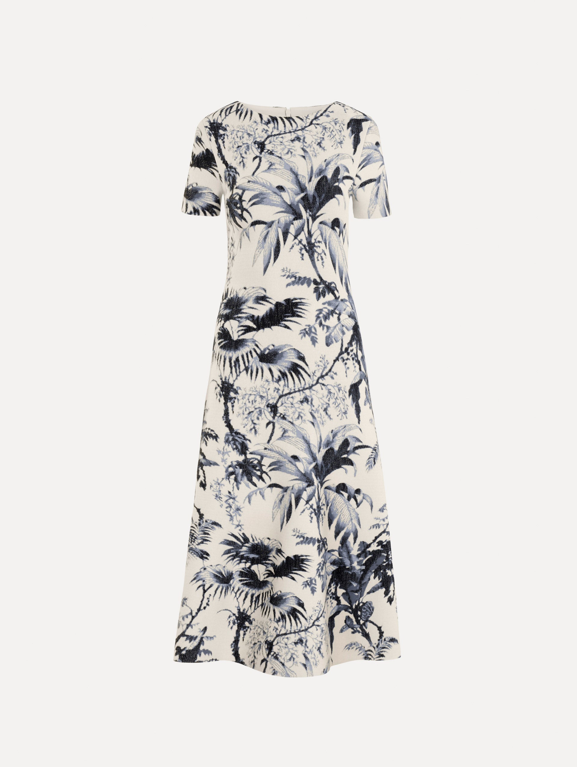 The Chiné Palm Leaves Knit Dress in Navy and Ivory. Featuring a classic silhouette with short sleeves and an A-line midi skirt. Front View.