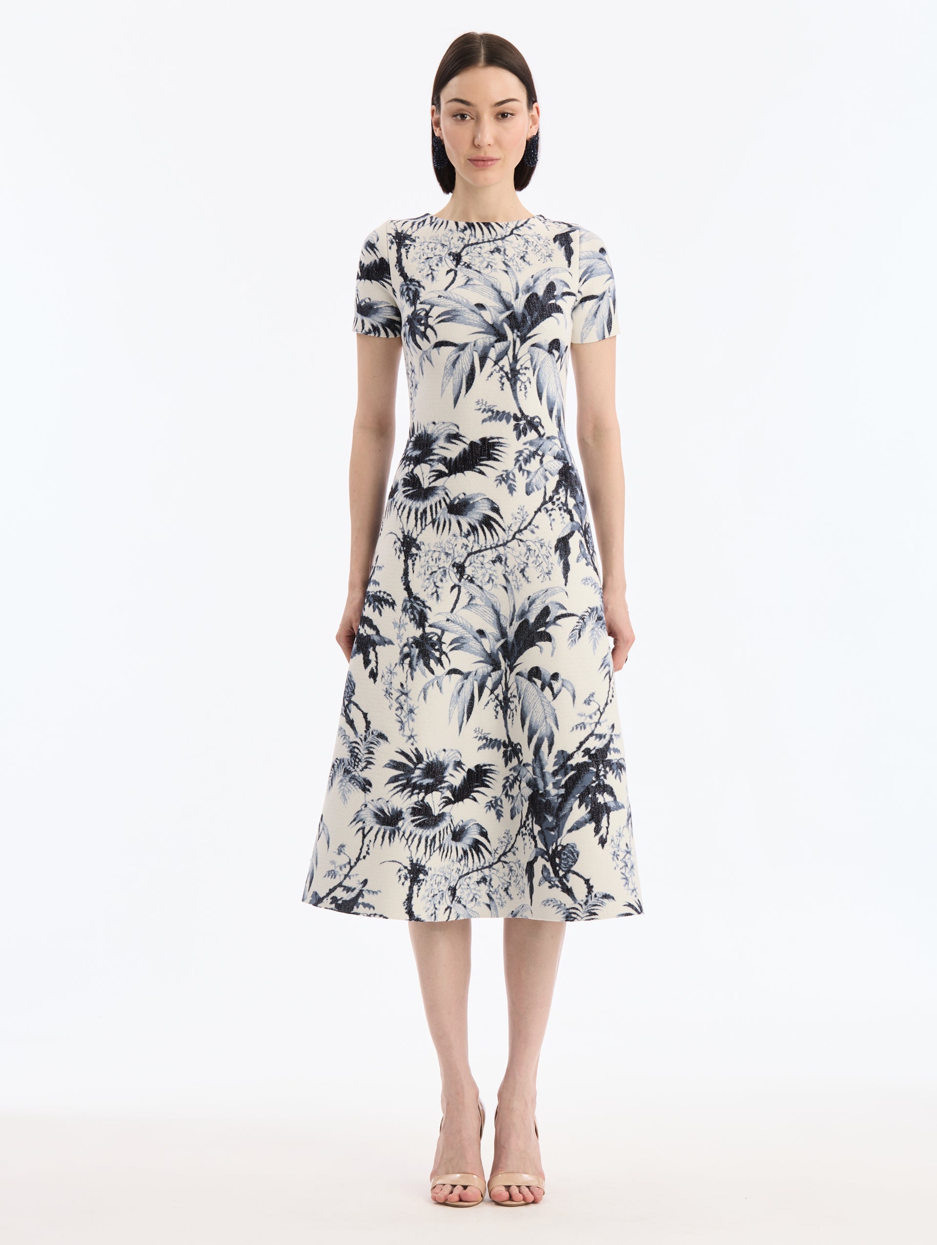 White Knit, Short sleeve Midi Dress with Navy Chiné Palm Leaves Print. Front View.
