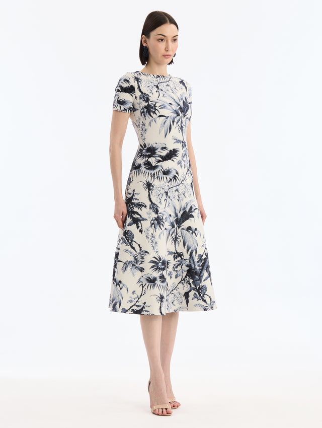 White Knit, Short sleeve Midi Dress with Navy Chiné Palm Leaves Print. Side View.