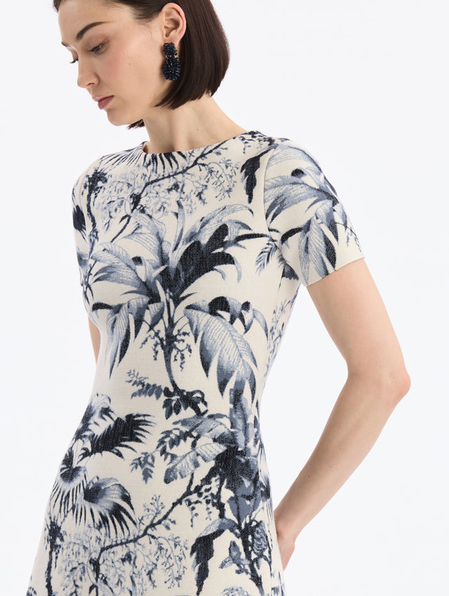 White Knit, Short sleeve Midi Dress with Navy Chiné Palm Leaves Print. Side View.
