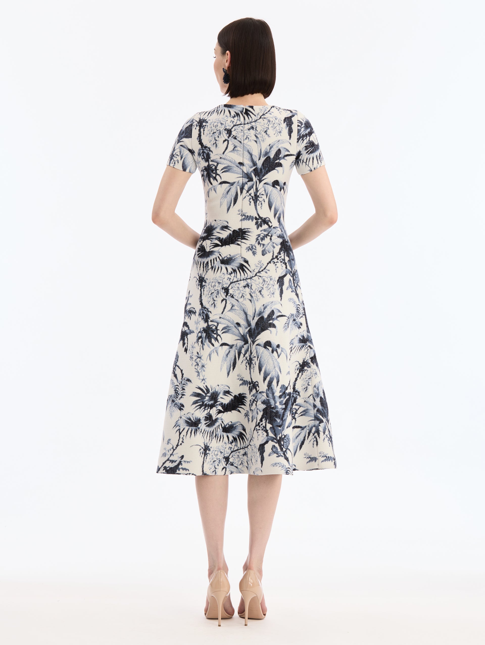 White Knit, Short sleeve Midi Dress with Navy Chiné Palm Leaves Print. Back View.