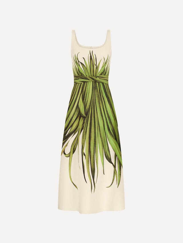 The Palm Leaves Cotton Poplin Dress. Featuring a scoop neckline, tank straps, cinched waist, and midi length. Front View.