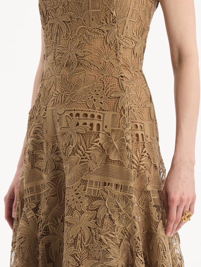 The model is wearing the Dominican Landscape Guipure Dress. Featuring a square neckline, tank straps, and lace guipure fabrication. Detail View.