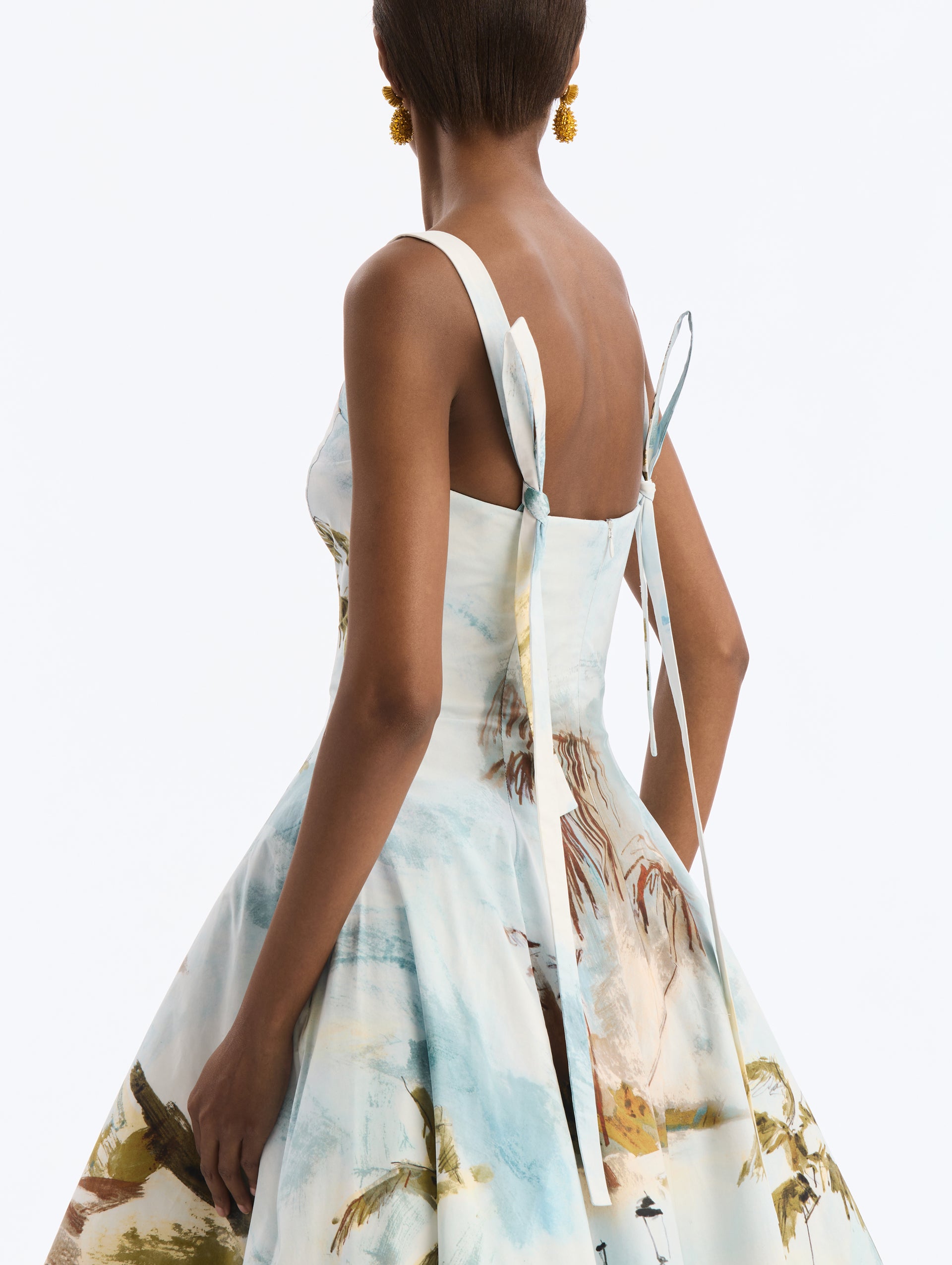 Cotton Poplin Sleeveless Midi Dress with Dominican Landscape Print. Close Up Side View.