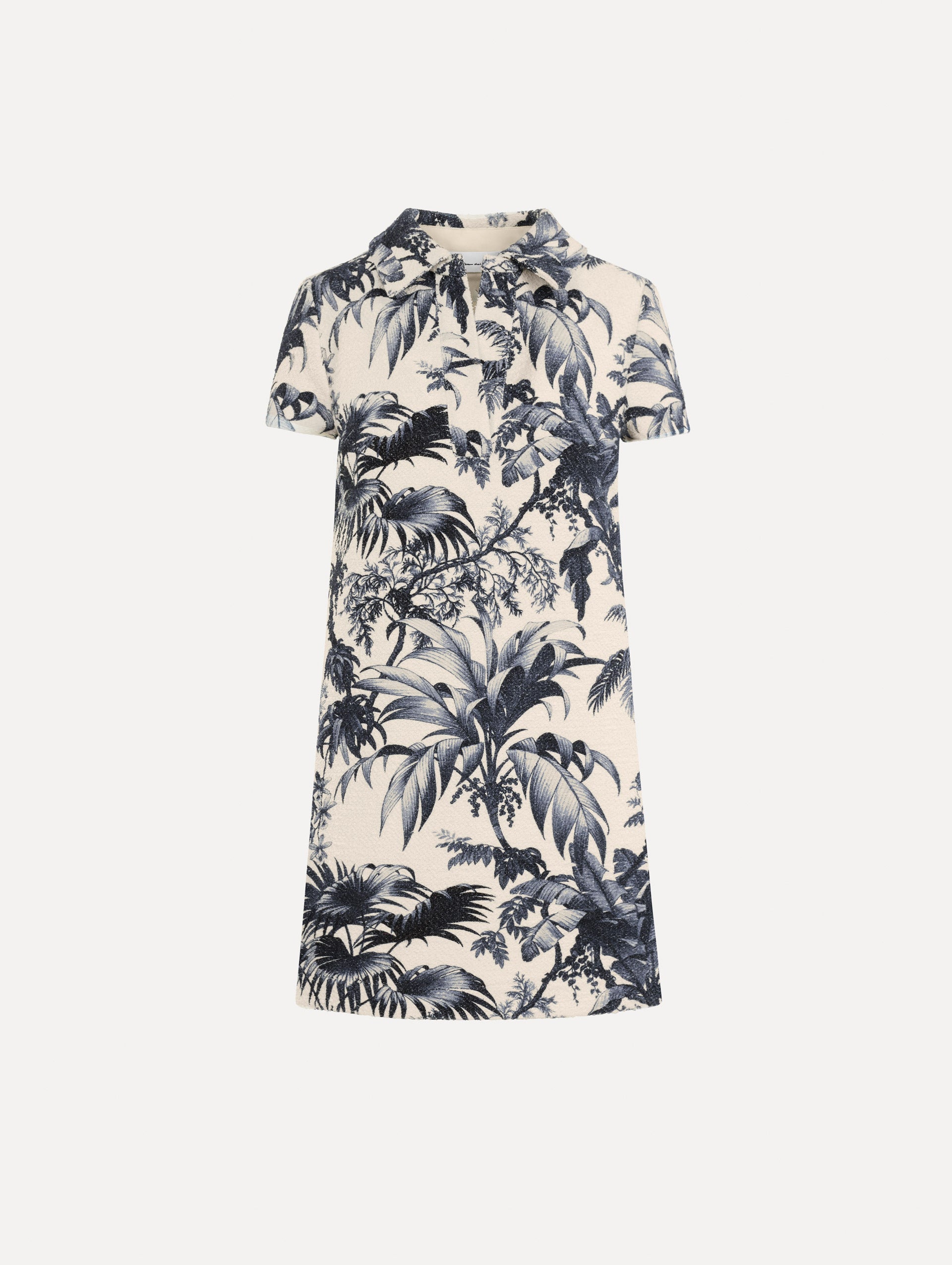 The Chiné Palm Leaves Shift Dress in ivory printed with navy palm leaves. Featuring a classic collar neckline, short sleeves, and mini length. Front View.