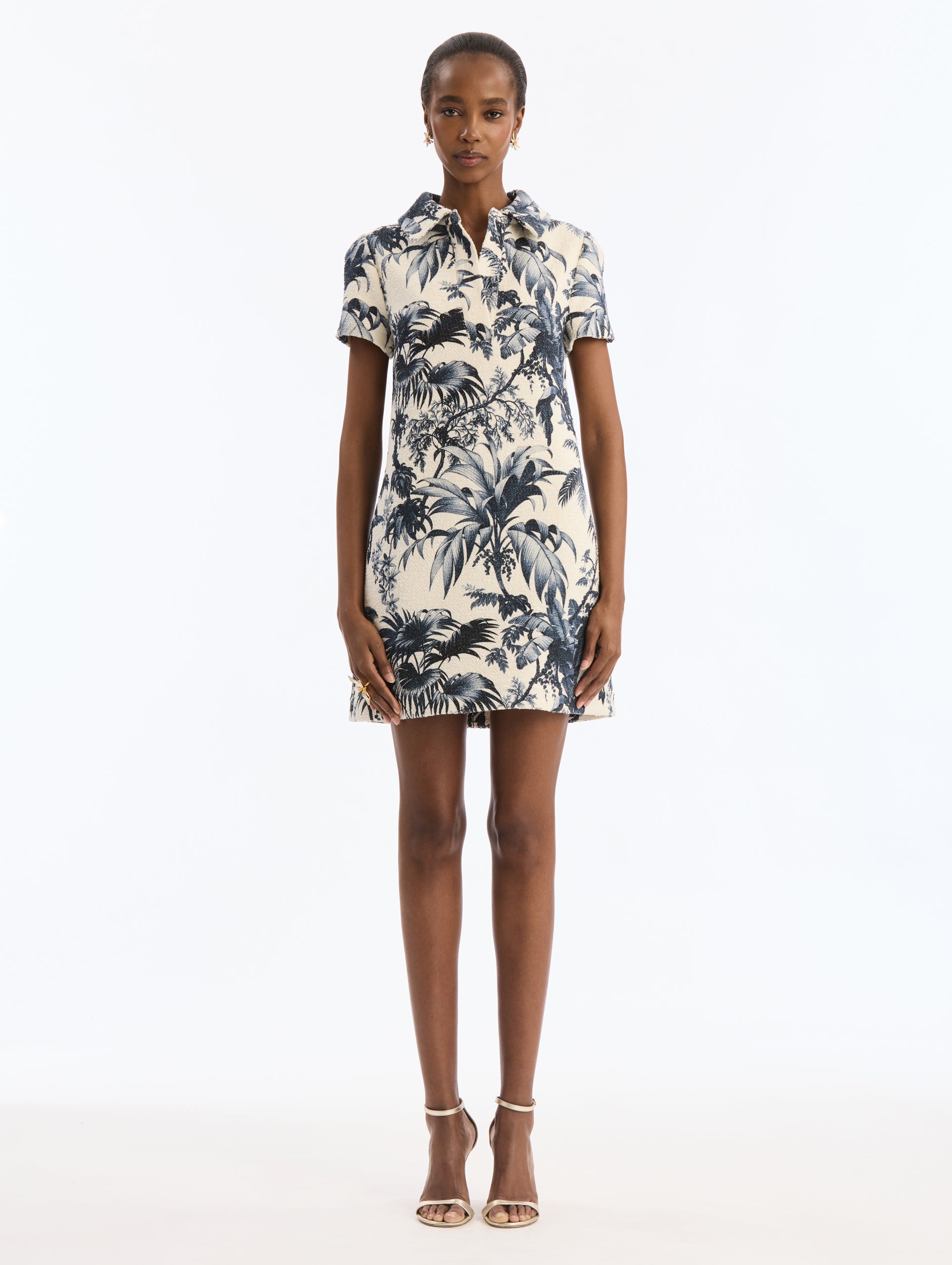 Ivory Mini Shift Dress, Short Sleeve, Collared with Navy Chiné Palm Leaves Print. Front View.