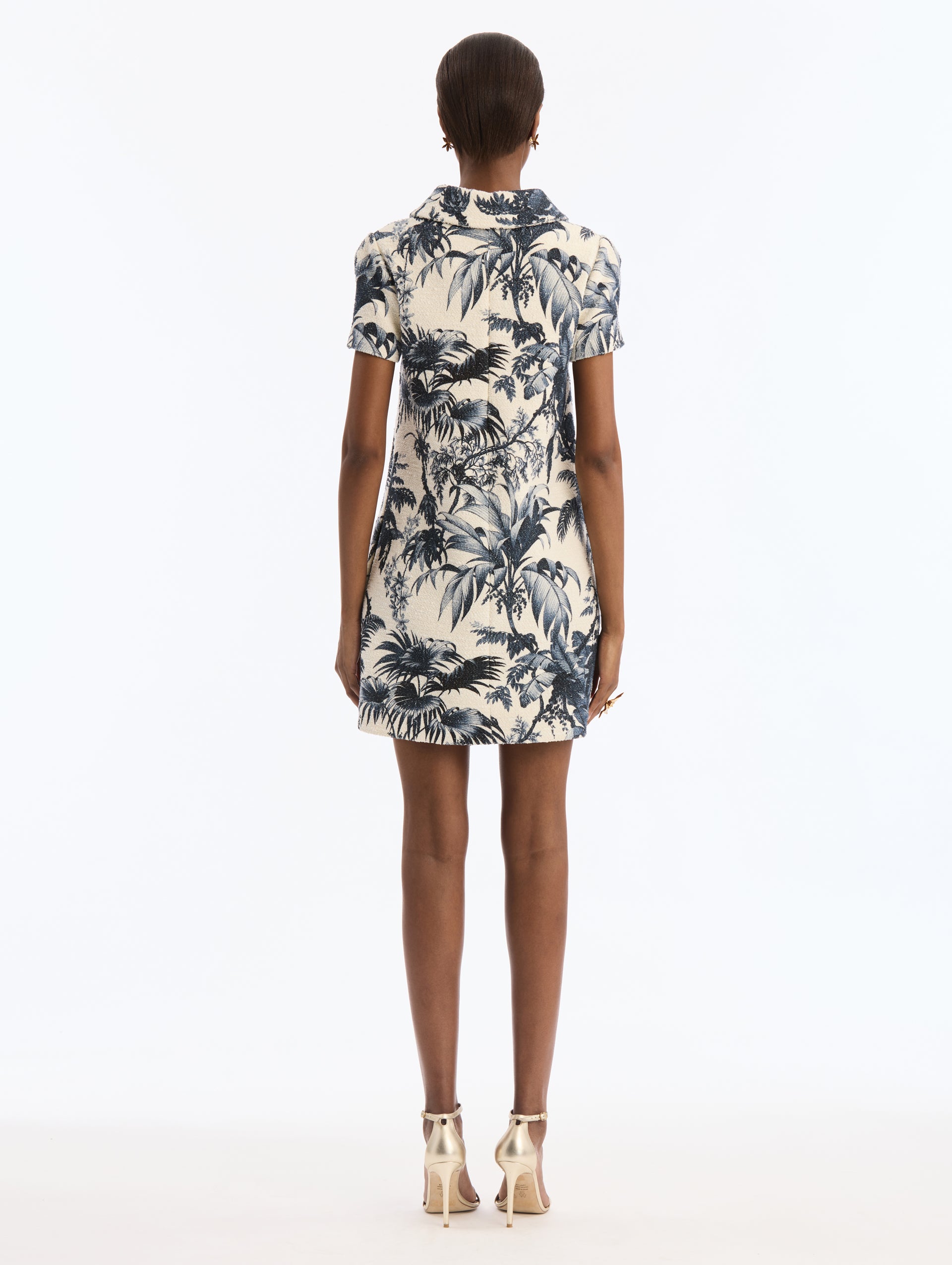 Ivory Mini Shift Dress, Short Sleeve, Collared with Navy Chiné Palm Leaves Print. Back View.