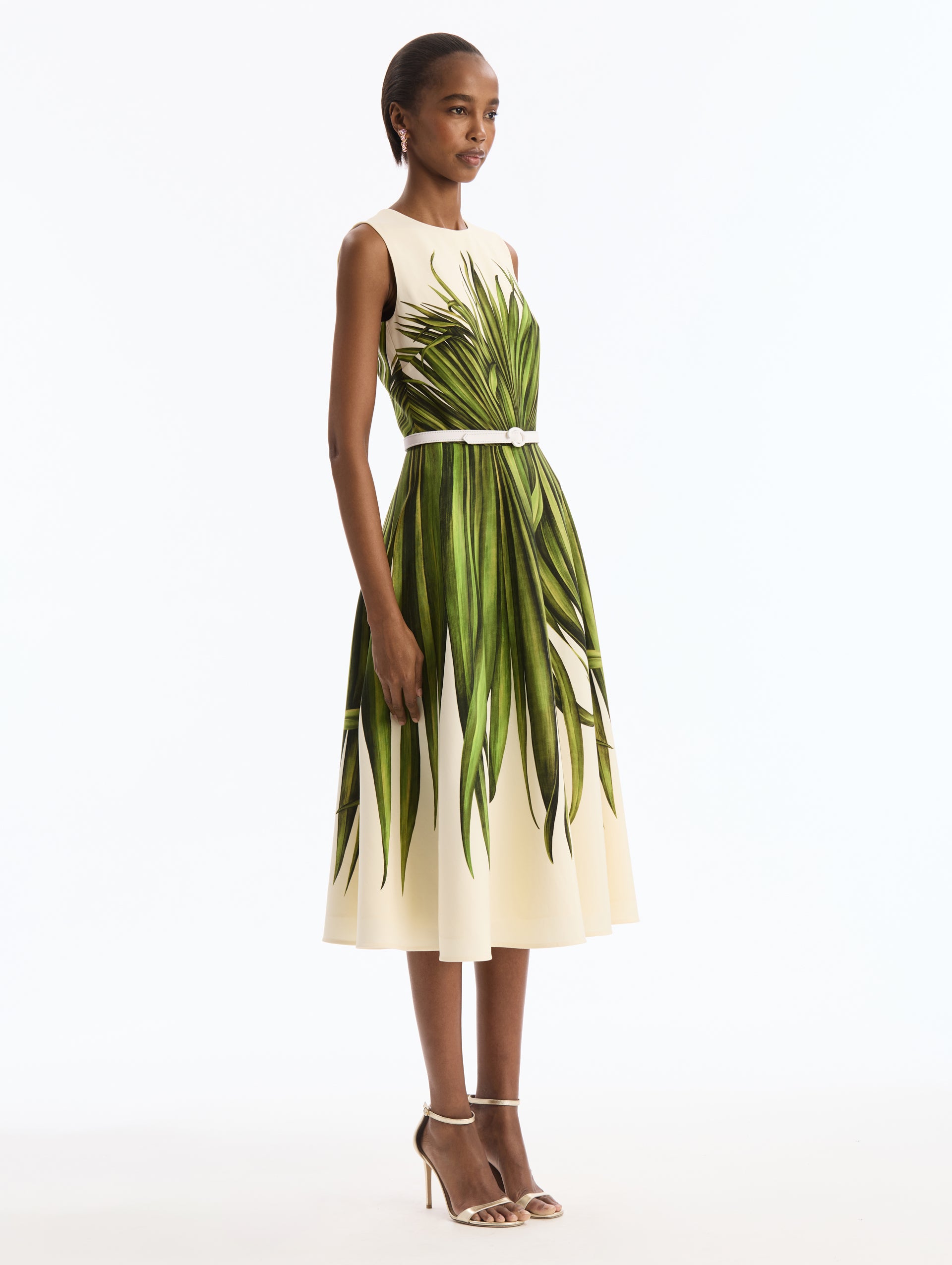 Ivory Wool Blend Dress with Green Palm Leaves Print. White Belt. Midi Length Dress. Boat Neck. Side View. 
