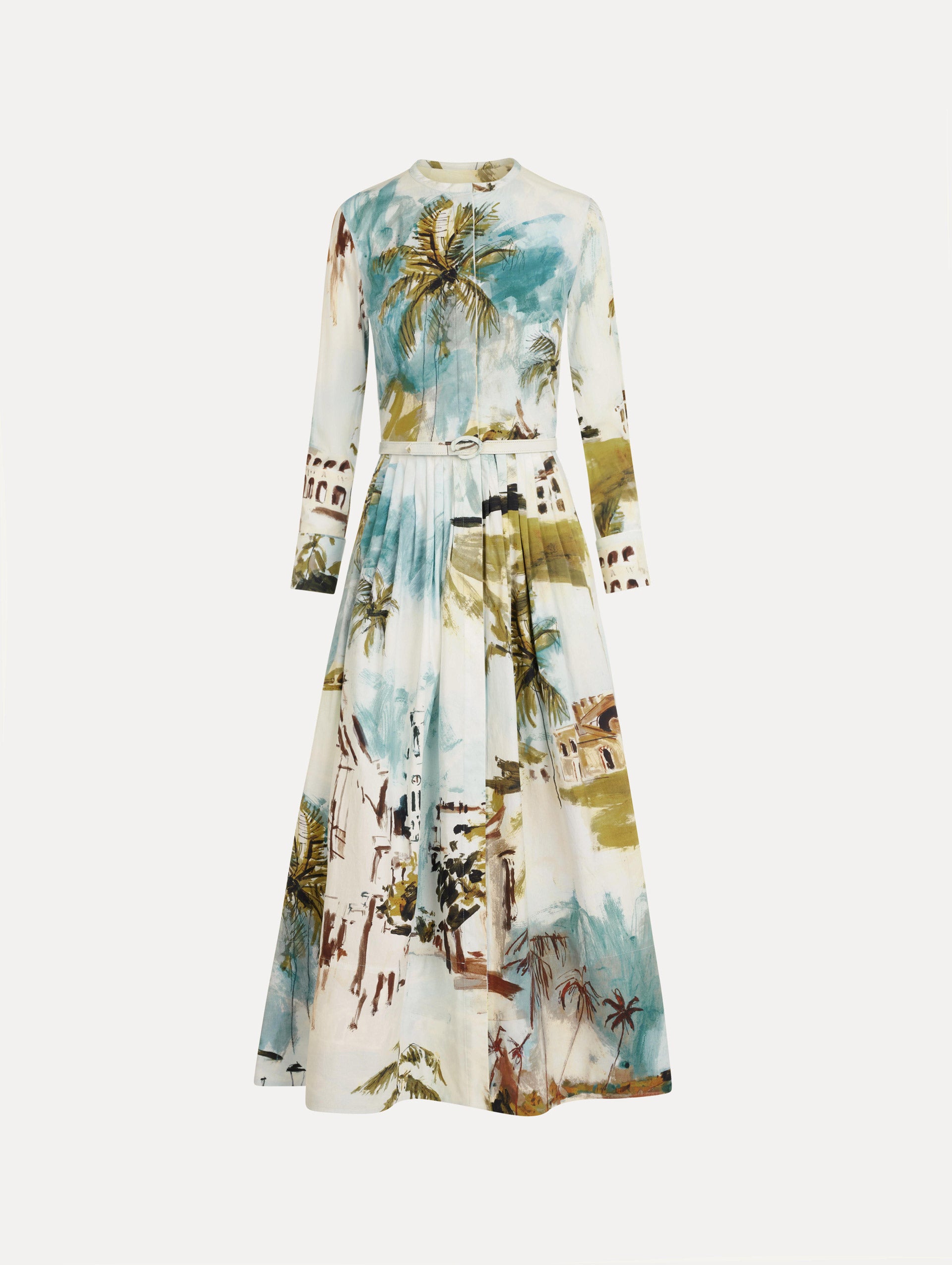 The Dominican Landscape Cotton Poplin Short-Sleeve Dress printed with the Dominican landscape. Featuring long sleeves, front-button closure, belt at waist, and pleated midi skirt. Front View.