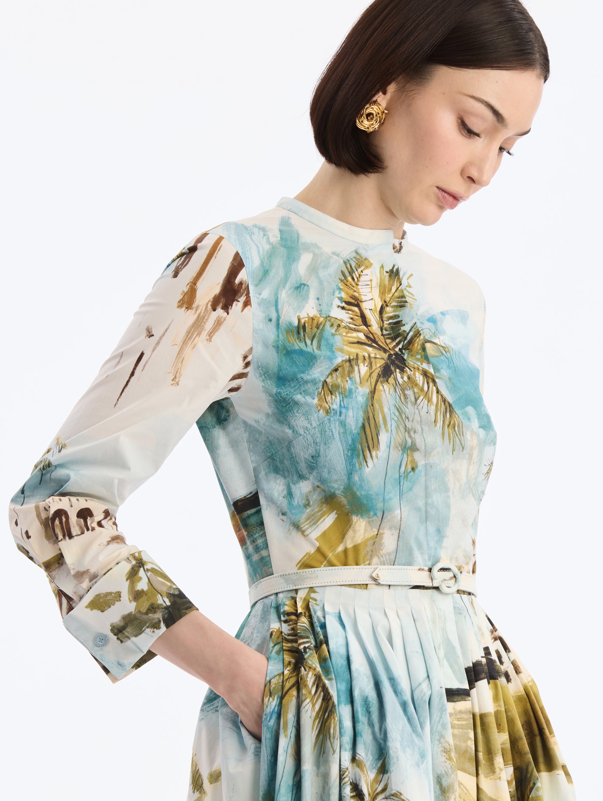Cotton Poplin Short-Sleeve Midi Dress with Dominican Landscape Print. Matching Belt. Long Sleeve. Close Up Side View.