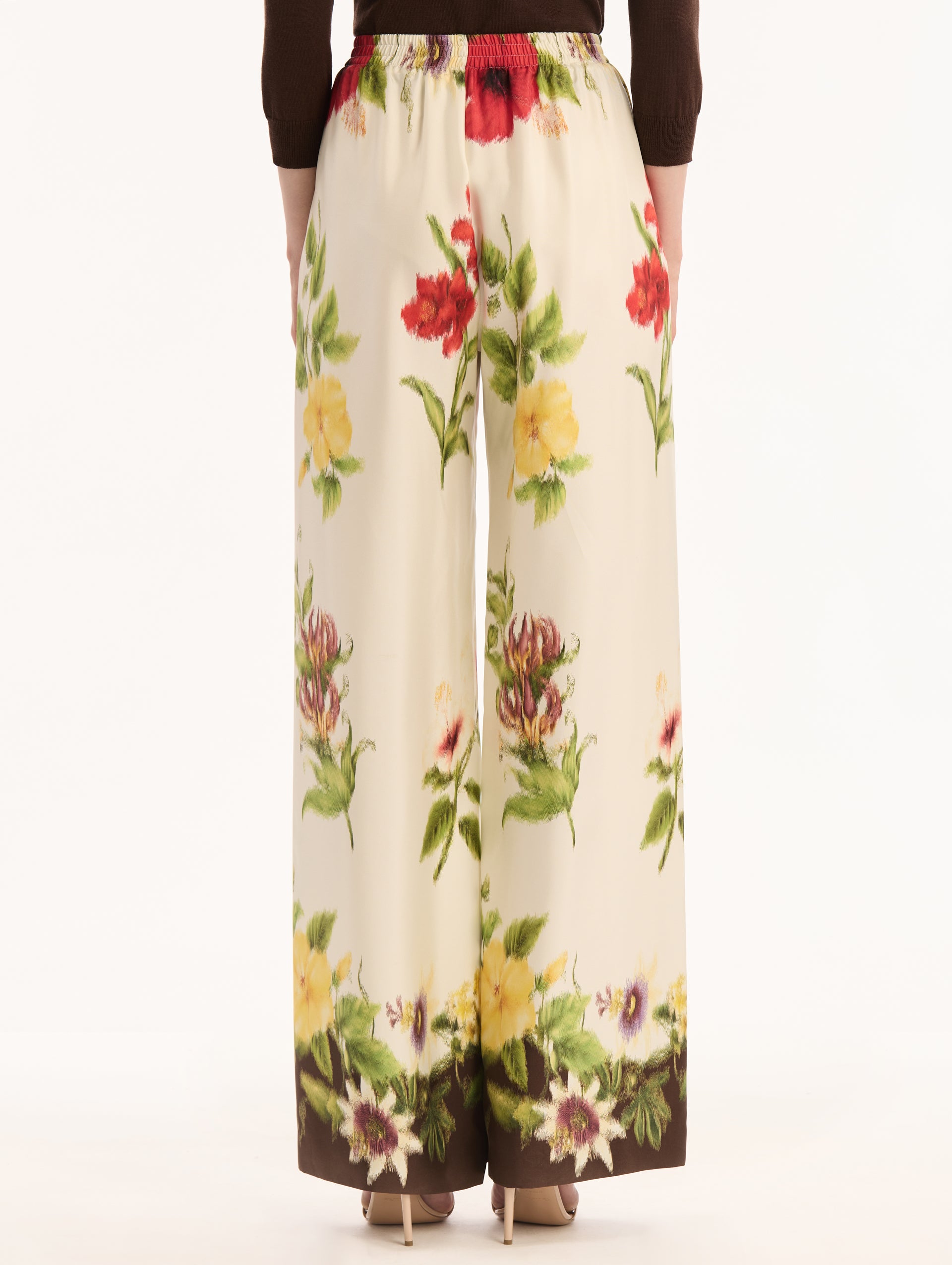 Dominican Mixed-Floral  Print on Wide Leg Pant. High waisted. Elastic Waist. Back View. 