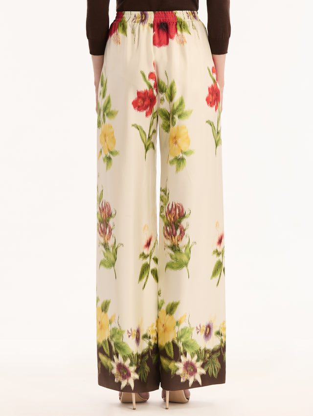 Dominican Mixed-Floral  Print on Wide Leg Pant. High waisted. Elastic Waist. Back View. 