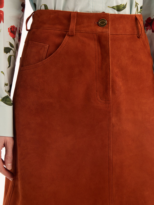 Suede Skirt in Tamarind. Pockets. Button Closure. Belt Loops. Front View.