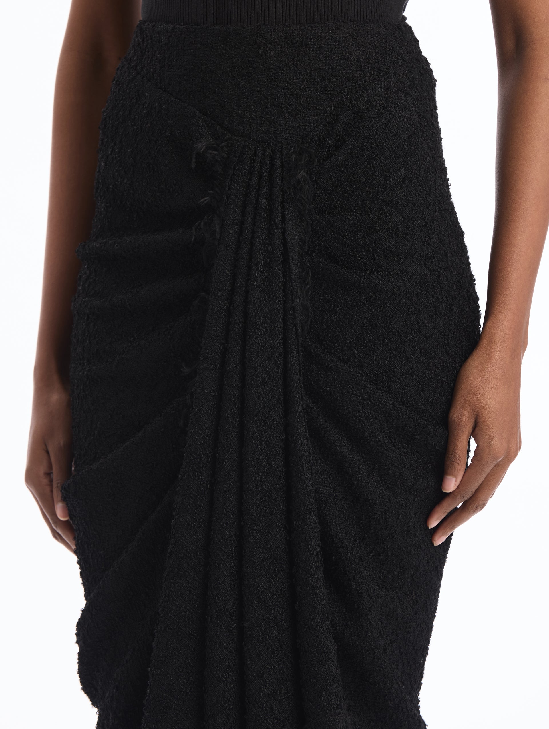 Black Draped Bouclé Skirt. Close Up Front View.