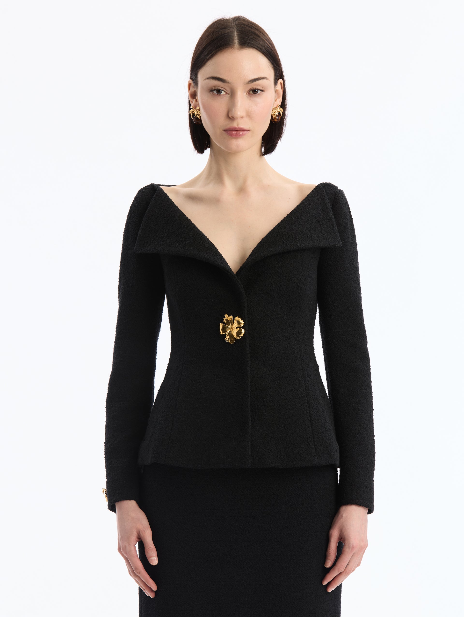 Black V-Neck Tweed Jacket with Gold Hibiscus Button. Front View. 