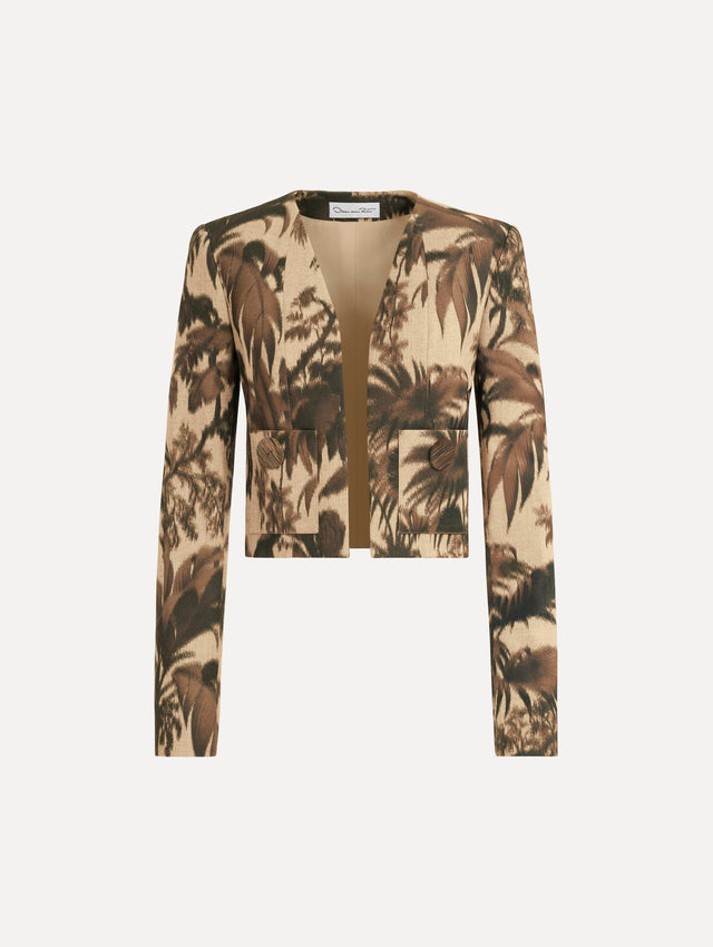 The Chiné Palm Leaves Jacket printed with brown palm leaves. Featuring long sleeves, front pockets with a button closure, and a tailored silhouette. Front View.