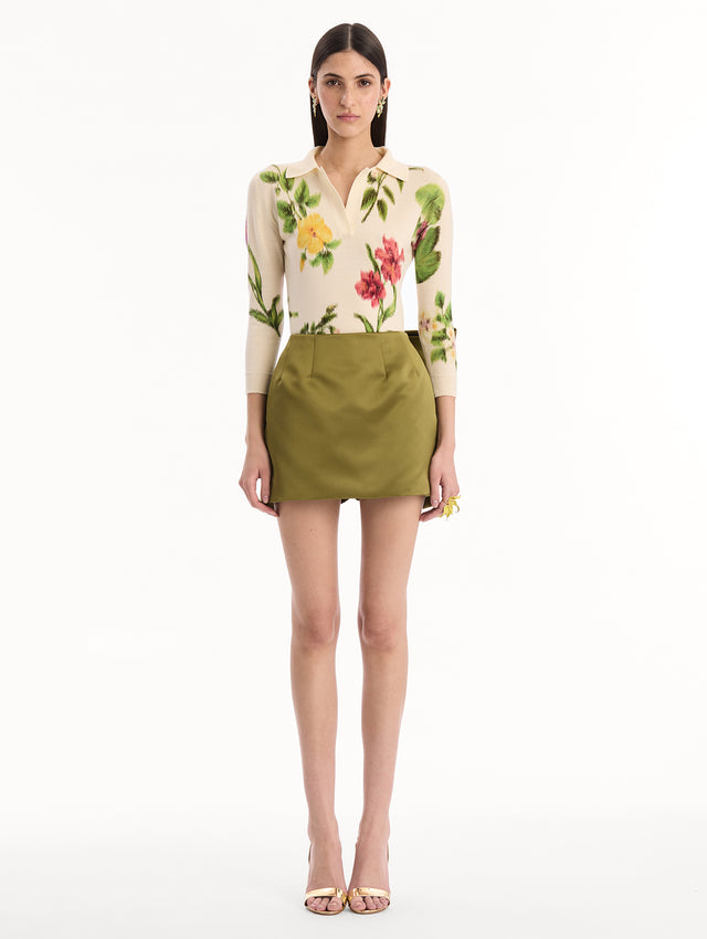 Draped Satin Mini Skort in Green. Bow Tie Back. Front View.