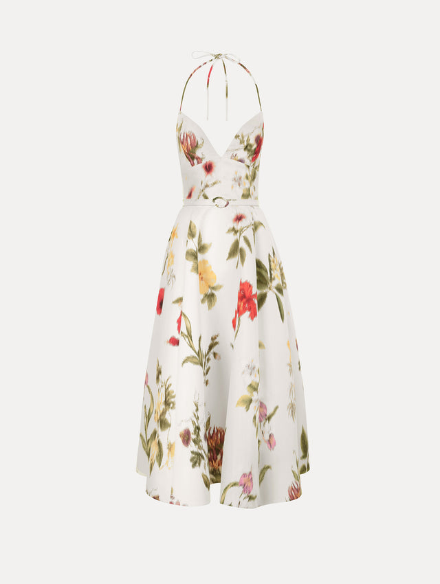 The Chiné Dominican Mixed-Floral Faille Cocktail Dress. Featuring a halter neckline, structured bodice, midi skirt, and belt at waist. Front View.