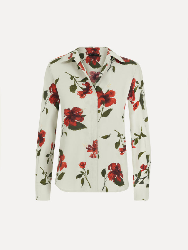The Hibiscus Cotton Poplin Blouse in a muted blue color printed with red hibiscus florals. Featuring a classic collar, button-front closure, long sleeves, and relaxed silhouette. Front View.