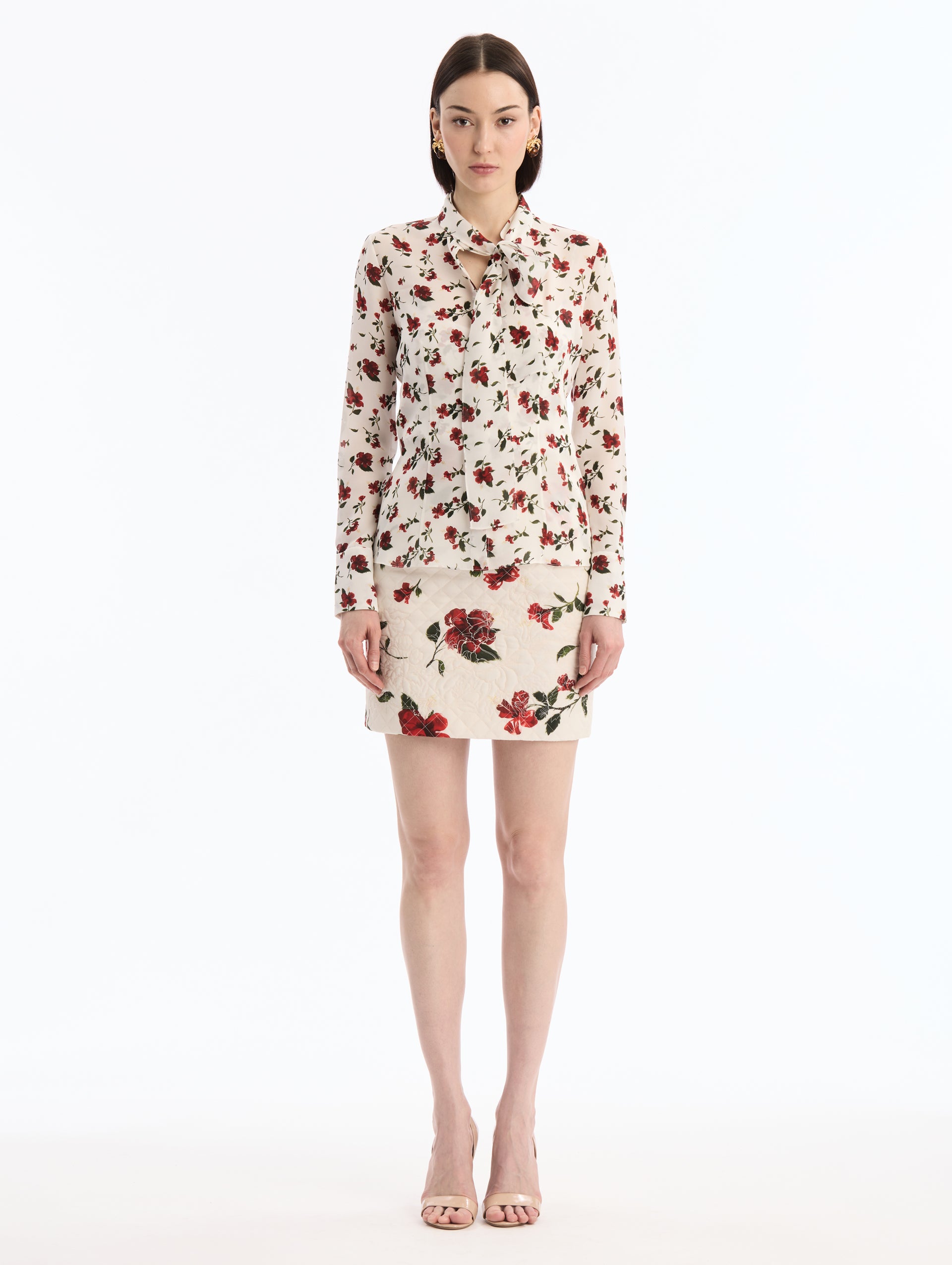 Long Sleeve White and Red Hibiscus Silk Blouse with Tied Neck. Front View. 