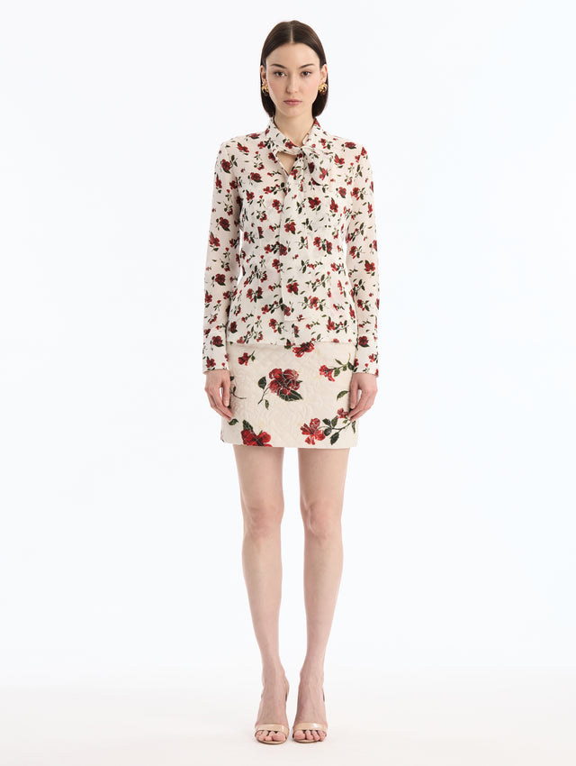 Long Sleeve White and Red Hibiscus Silk Blouse with Tied Neck. Front View. 