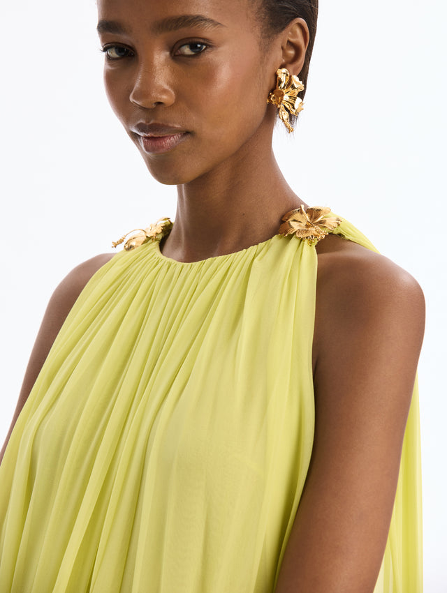 Yellow Silk Chiffon Caftan with Gold Hibiscus Shoulder Detail. Close Up Side View.