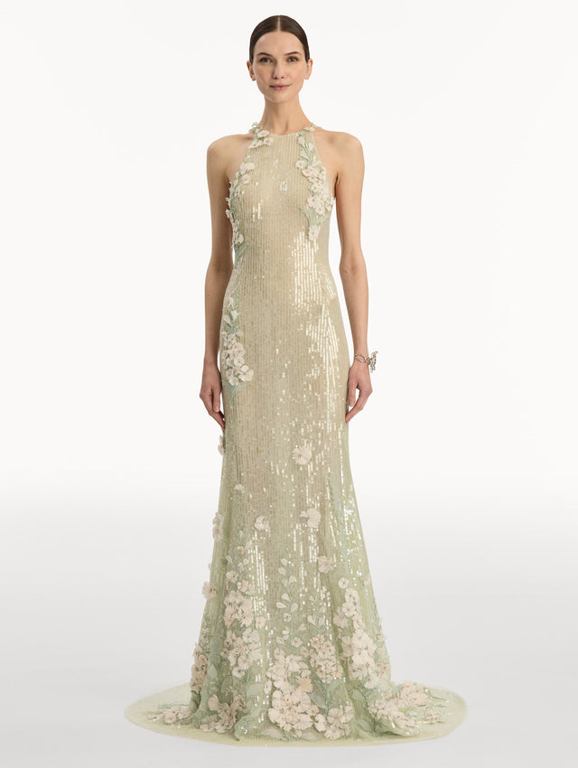 Light green ombre Foxglove Embroidered Sequin Tulle Gown with high sleeveless neckline and floral applique. Front View.