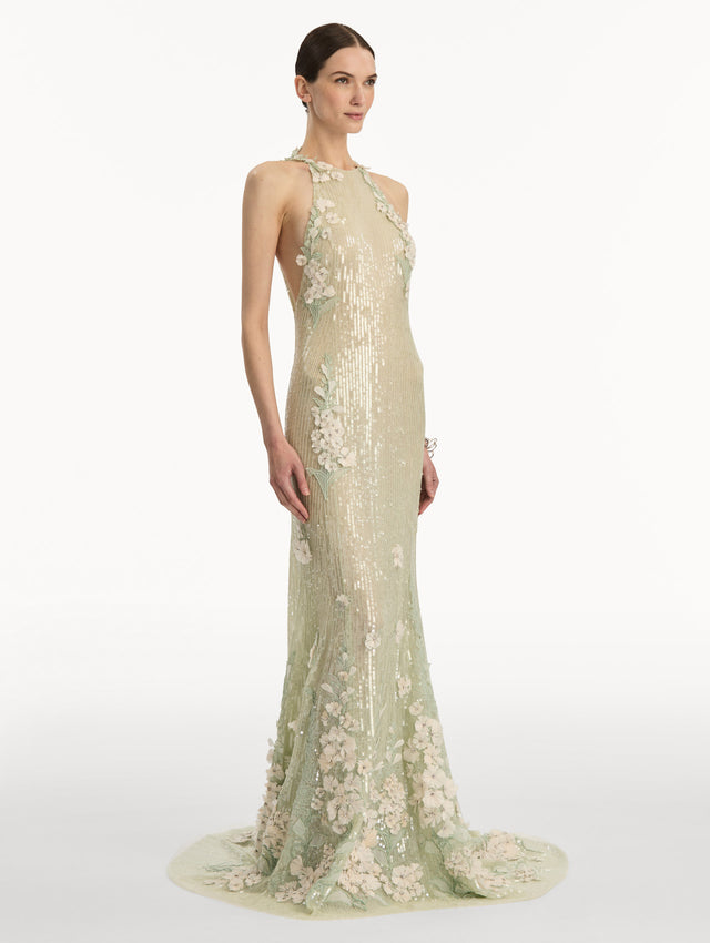 Light green ombre Foxglove Embroidered Sequin Tulle Gown with high sleeveless neckline and floral applique. Side View.