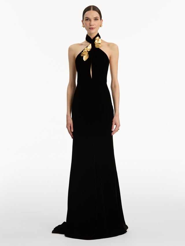 Black Gold Leaf Embroidered Velvet Gown with a wrap halter neckline and keyhole. Front View.