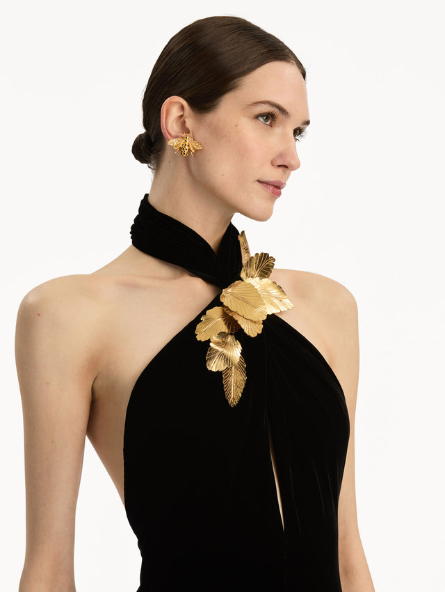 Black Gold Leaf Embroidered Velvet Gown with a wrap halter neckline and keyhole. Zoom View.