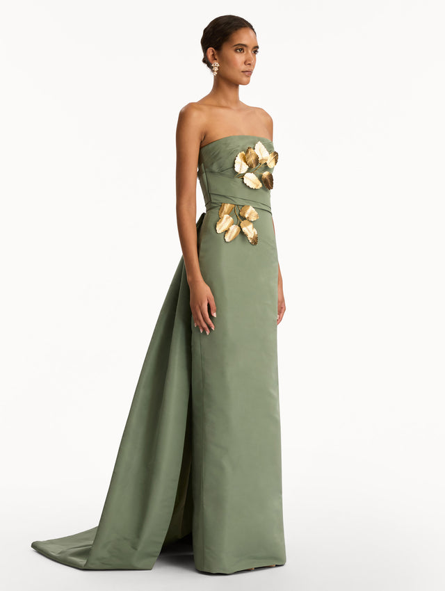 Green Gold Leaf Embroidered Faille Gown with strapless neckline and wrapped bodice. Side View.