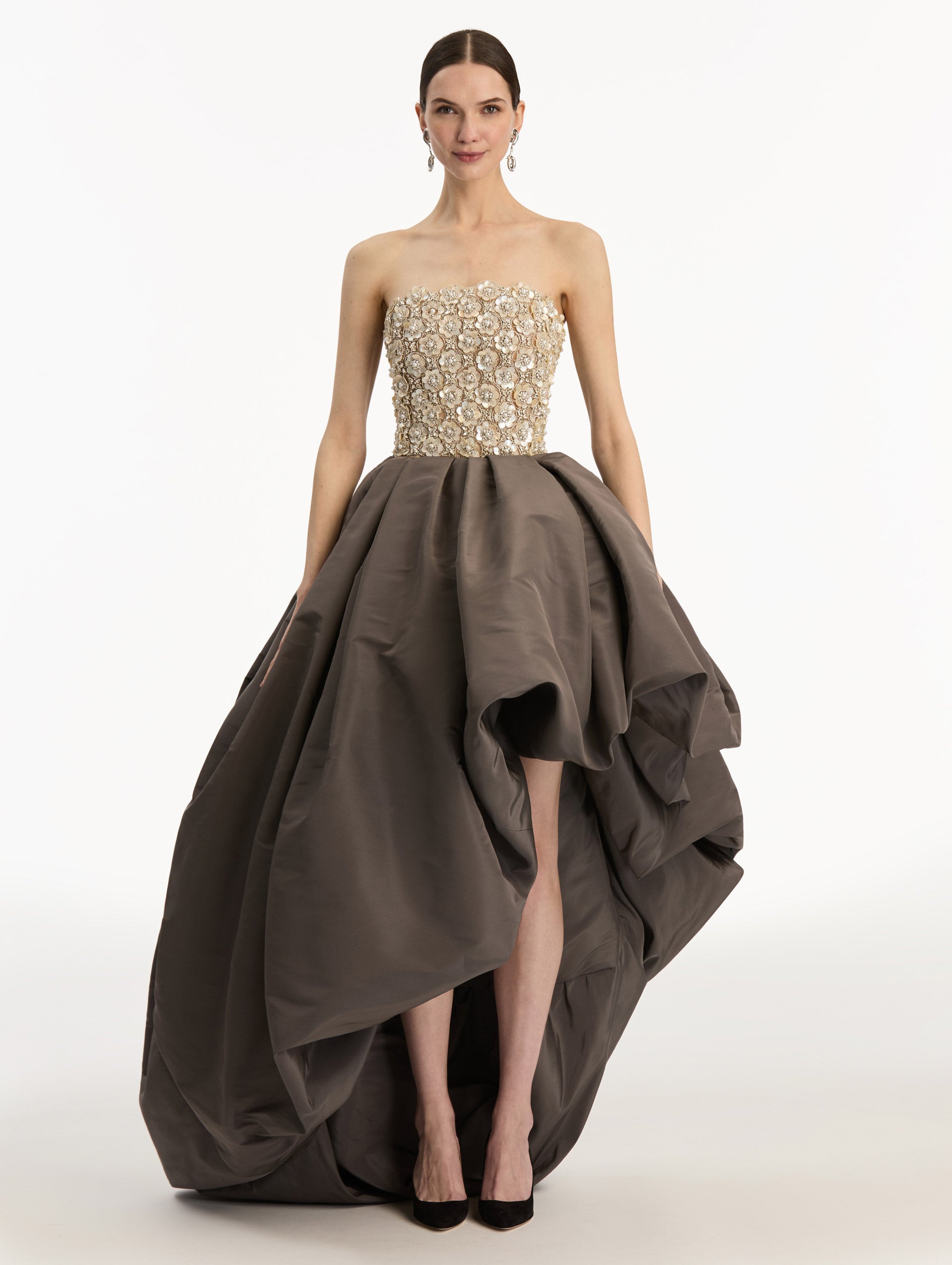 Brown and Beige Mother of Pearl Embroidered High-Low Gown with brown draped skirt and embroidered strapless bodice. Front View.