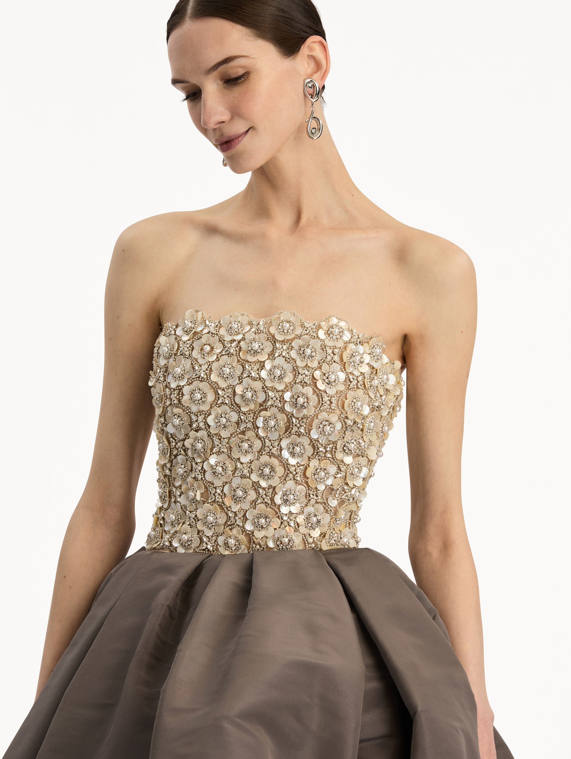 Brown and Beige Mother of Pearl Embroidered High-Low Gown with brown draped skirt and embroidered strapless bodice. Zoom View.