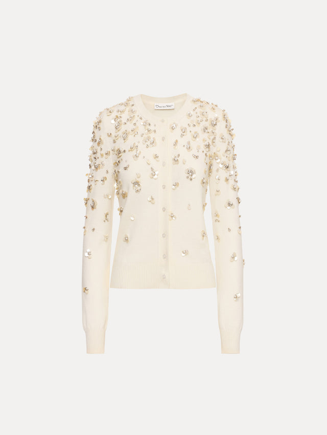 Ivory Mother of Pearl Embroidered Cardigan featuring a crew neckline, button front, and sequin floral embellishments throughout.