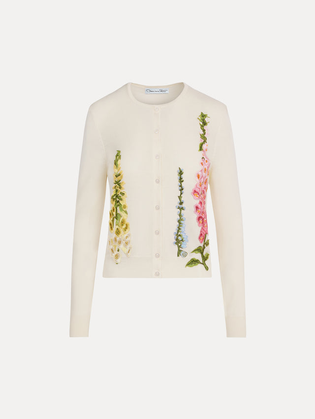 White Foxglove Threadwork Cardigan with climbing yellow and pink floral applique. Front View.