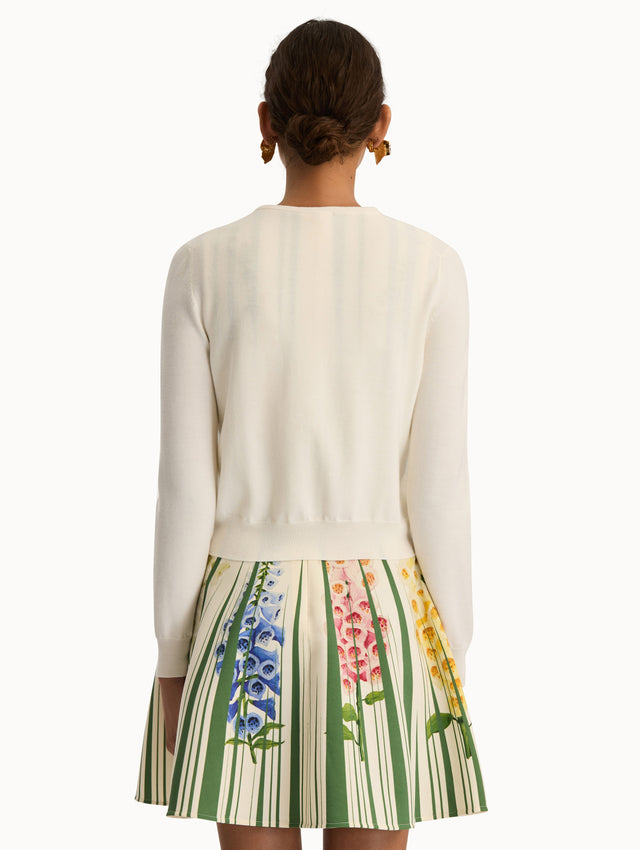 White Foxglove Threadwork Cardigan with climbing yellow and pink floral applique. Back View.