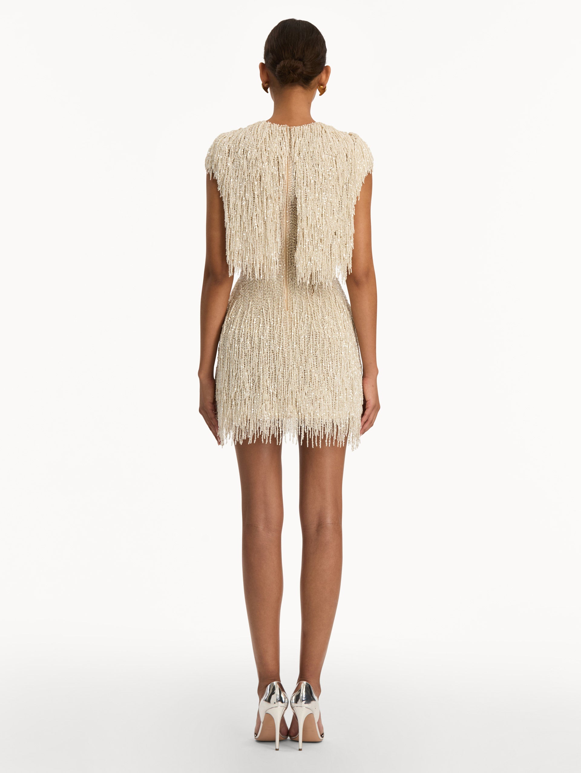 Ivory Pearl Fringe Cocktail Dress featuring a fitted silhouette with cascading beaded fringe embellishments. Back View.
