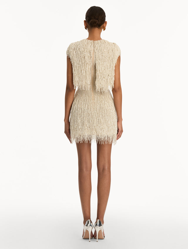 Ivory Pearl Fringe Cocktail Dress featuring a fitted silhouette with cascading beaded fringe embellishments. Back View.