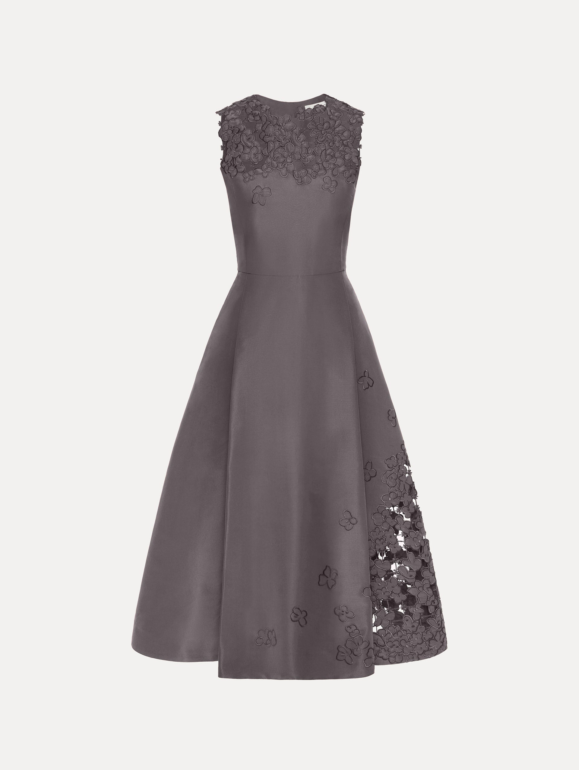 The Floral Cutout Threadwork Dress in the color stone grey featuring a cut-out threadwork embroidery neckline and floral lattice at the skirt.
