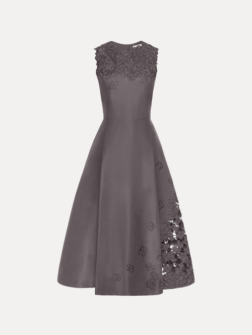The Floral Cutout Threadwork Dress in the color stone grey featuring a cut-out threadwork embroidery neckline and floral lattice at the skirt.