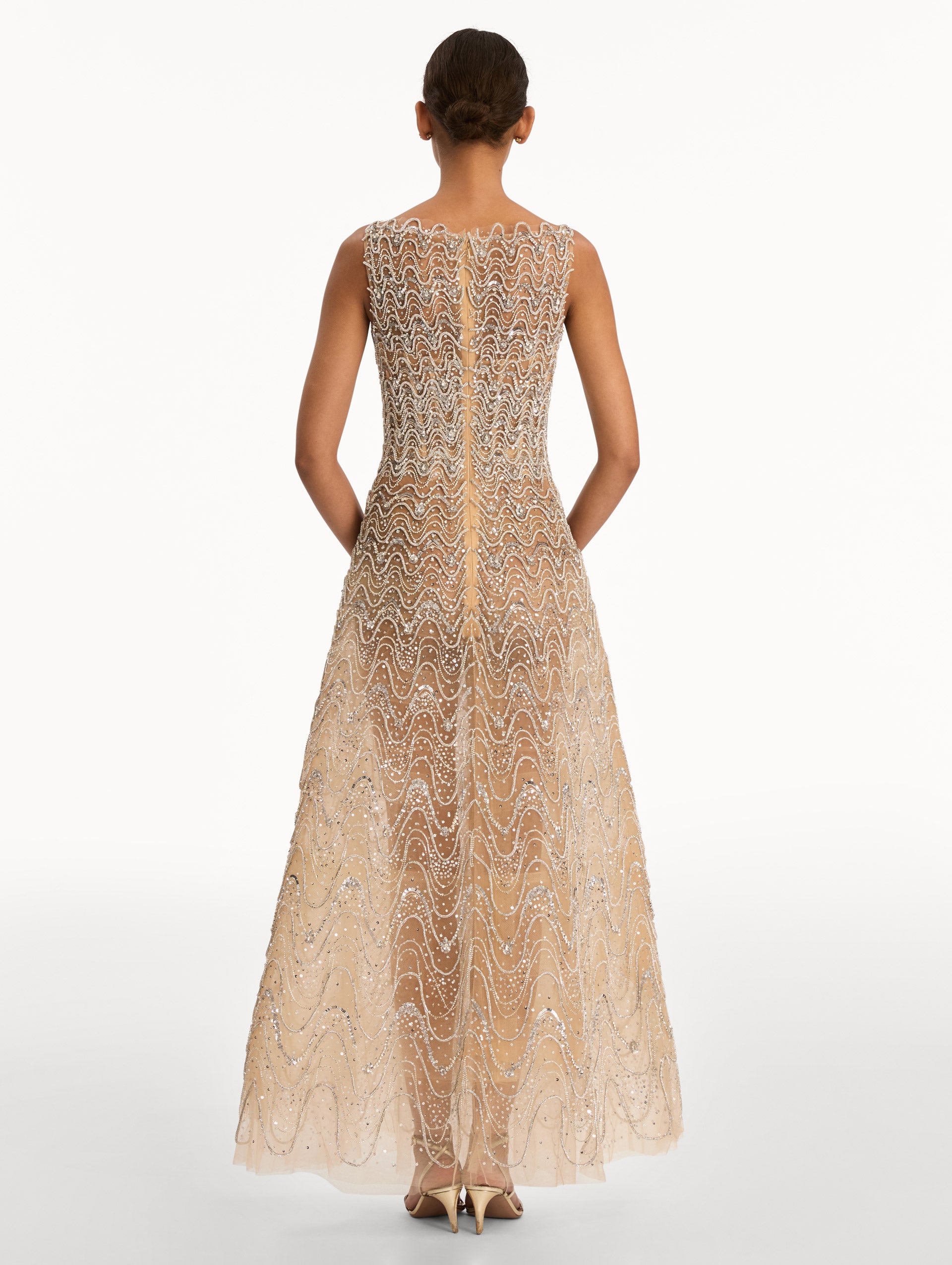 Beige Crystal Wave Embroidered Dress with strapless wave neckline and sheer metallic finish. Back View.