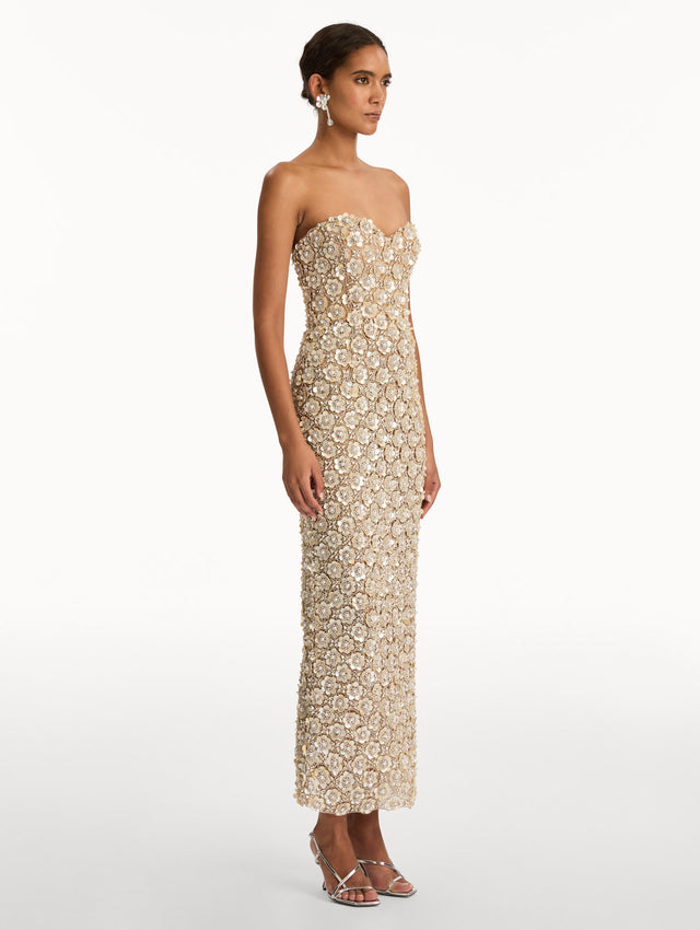 Ivory and Gold Mother of Pearl Embroidered Column Gown with allover crystal embellishments. Side View.