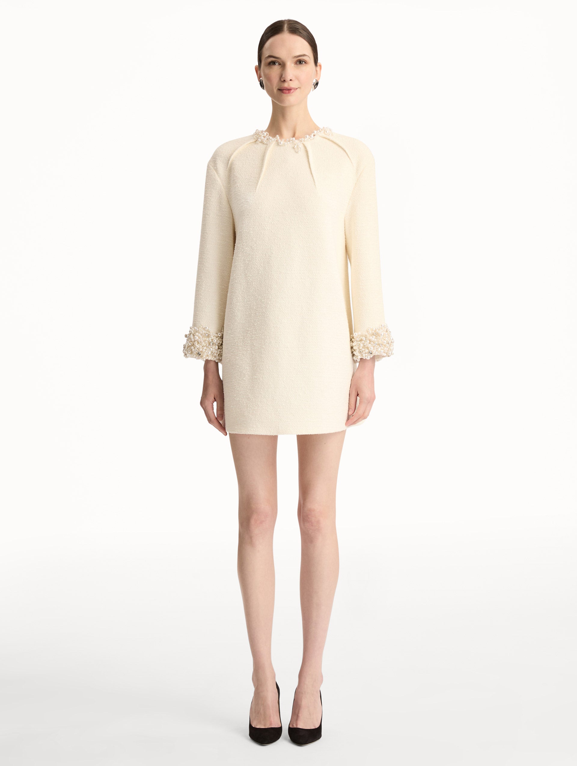 White Pearl Embroidered Tweed Shift Dress featuring embellished sleeves and pleated neckline. Front View. 