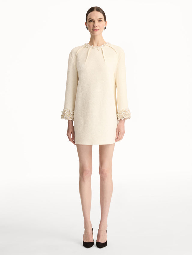 White Pearl Embroidered Tweed Shift Dress featuring embellished sleeves and pleated neckline. Front View. 