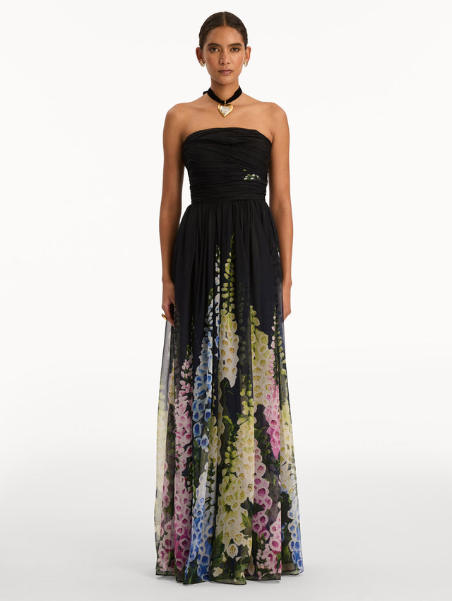 Black and Floral Degradé Foxglove Chiffon Gown with printed floral pattern and a strapless neckline. Front View.