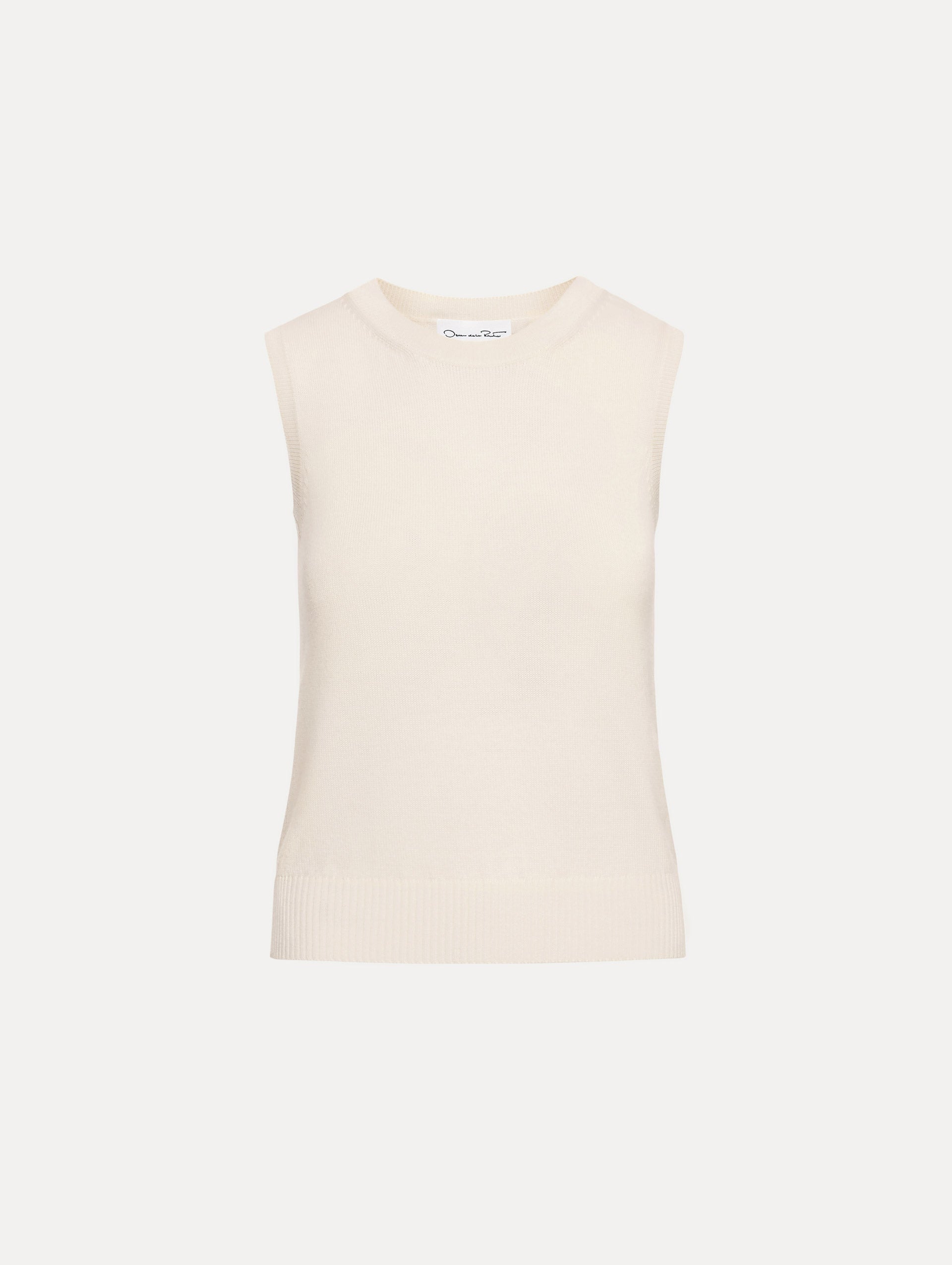 Ivory Virgin Wool Tank featuring a crew neckline and ribbed hem.
